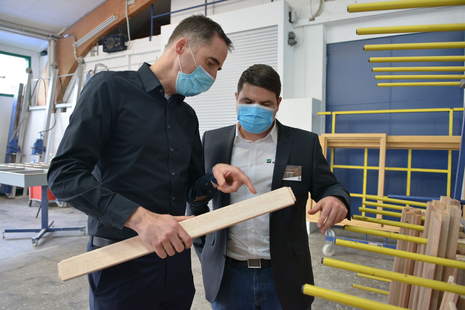 Achim Binder (KLAES) 和 Markus Beermann (WEINIG)交换意见